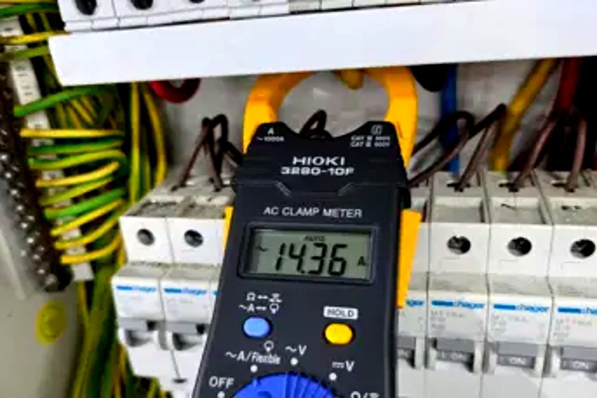 A residential electrical distribution board in Singapore with a tripped circuit breaker requiring repair.